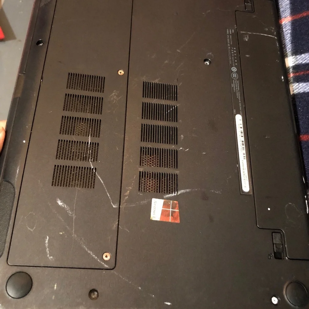 Apple MacBook with 4 chargers and dell laptop for parts